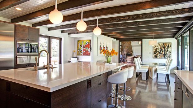 large kitchen island with a white quartz countertop